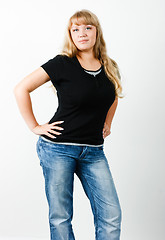 Image showing Young woman in jeans with long hair