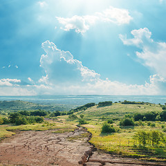 Image showing hot sun over cracked mountain