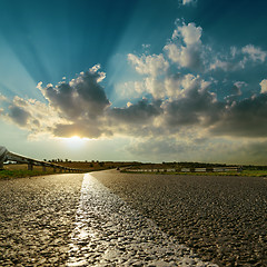 Image showing asphalt road close up to sunset