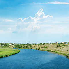Image showing blue river under light cloudy sky
