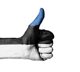 Image showing Closeup of male hand showing thumbs up sign