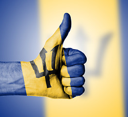 Image showing Closeup of male hand showing thumbs up sign