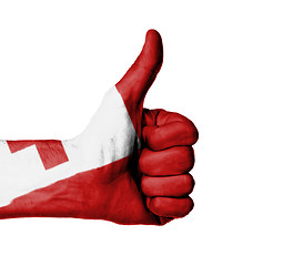 Image showing Closeup of male hand showing thumbs up sign