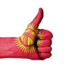 Image showing Closeup of male hand showing thumbs up sign