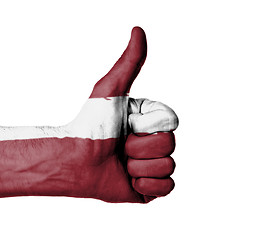 Image showing Closeup of male hand showing thumbs up sign