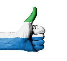 Image showing Closeup of male hand showing thumbs up sign