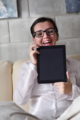 Image showing woman using tablet pc at home