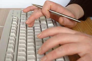 Image showing Woman typing