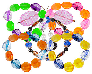 Image showing Bracelets and earrings made of handmade glass. Collage