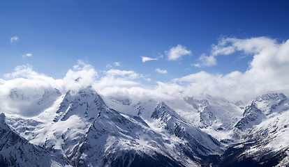 Image showing Panorama of snowy mountains in clouds