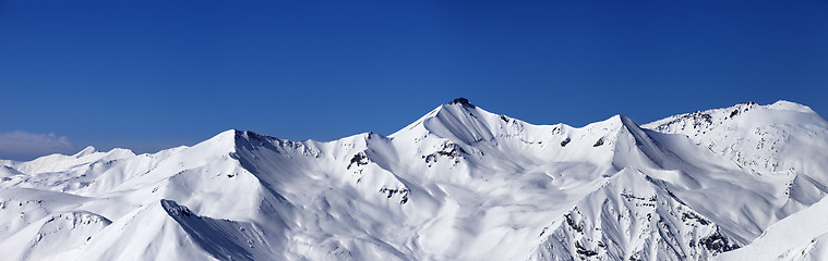 Image showing Panoramic view on off-piste slopes and blue sky at nice day