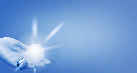 Image showing Background with lit lightbulb