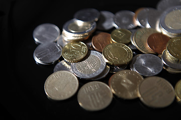 Image showing Coins on black