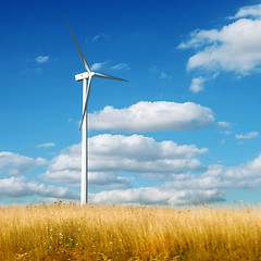 Image showing Wind generator turbine on summer landscape