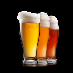 Image showing Different beer in glasses isolated on white background