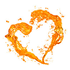 Image showing Heart from yellow water splash with bubbles isolated on white