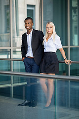 Image showing young successful business man and woman outdoor