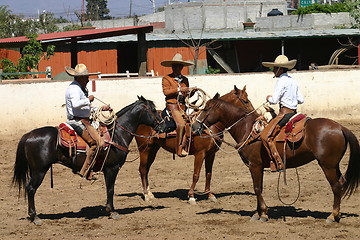 Image showing Three Mexican charros