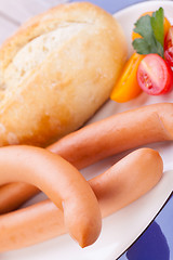 Image showing tasty sausages frankfurter with grain bread 