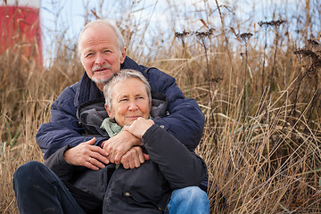 Image showing happy mature couple relaxing baltic sea dunes 