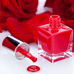 Image showing Elegant red nail varnish in a stylish bottle