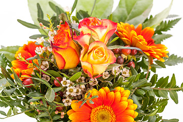 Image showing Vivid orange gerbera daisy in a bouquet