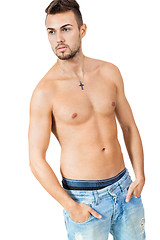 Image showing young attractive man in jeans and naked body isolated