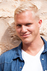 Image showing attractive young adult man standing outside 