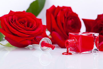 Image showing Elegant red nail varnish in a stylish bottle