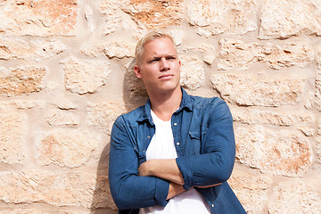 Image showing attractive young adult man standing outside 