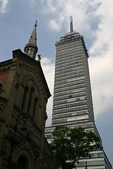 Image showing Old and new, reaching for the sky