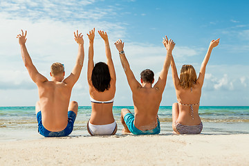 Image showing young happy friends havin fun on the beach