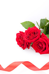 Image showing Bouquet of red roses with ribbon border