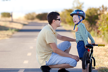 Image showing family biking