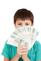 Image showing boy holding a fan from czech crown banknotes