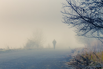 Image showing men silhouette in the fog