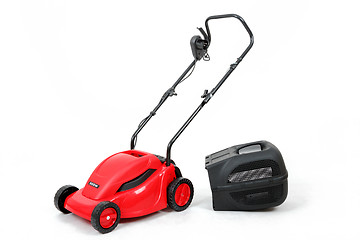 Image showing new red lawnmower on white background