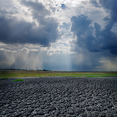 Image showing drought land and dramatic sky with clouds