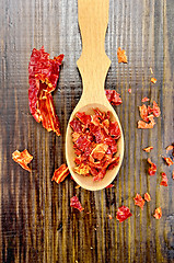 Image showing Pepper red hot chili in a spoon on the board on top