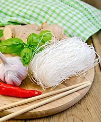 Image showing Noodles rice thin with a napkin on the board