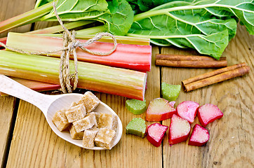 Image showing Rhubarb with sugar and cinnamon on the board
