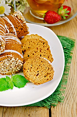 Image showing Cookies honey with strawberries on board