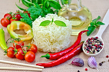 Image showing Noodles rice twisted with oil and vegetables