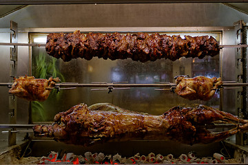 Image showing the grill roasted a pig, a goat in the chicken