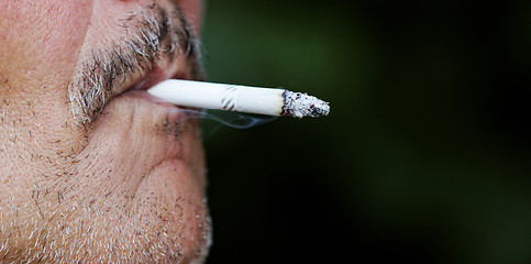 Image showing Man smoking a cigarette