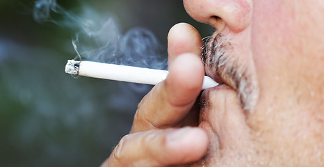 Image showing Man smoking a cigarette