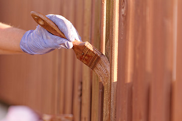 Image showing planks fence dyeing