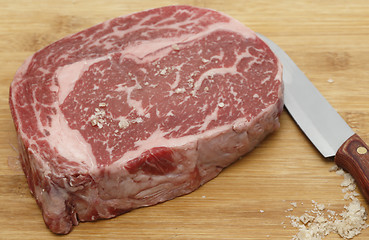 Image showing Seasoning wagyu beef with salt