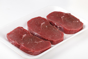 Image showing Three raw beef minute steaks