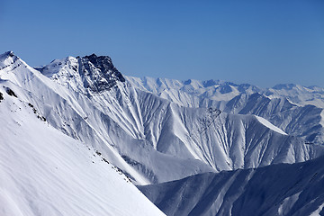 Image showing Snowy winter mountains in haze